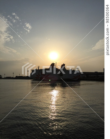 Harbor with sea and passenger ships at sunset Harbor with sea and passenger ships at sunset 98500364