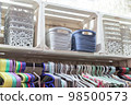 Wardrobe storage. Organization of home space and order in the house. Storage boxes and clothes hangers 98500573