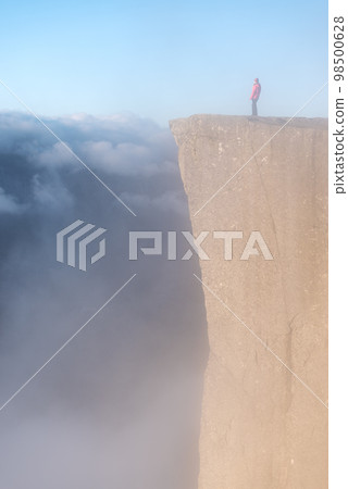Cliff Preikestolen at fjord Lysefjord, Norway Cliff Preikestolen at fjord Lysefjord, Norway 98500628