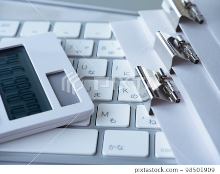 Business image of documents and personal computers Business image of documents and personal computers 98501909