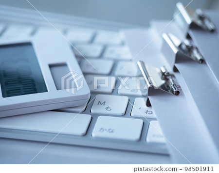 Business image of documents and personal computers Business image of documents and personal computers 98501911