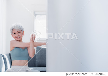 Senior woman training at home 98502062