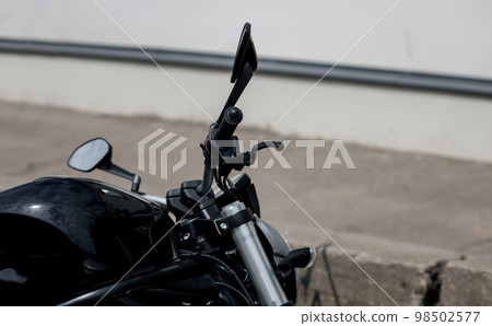 close-up of the steering wheel of the bike 98502577