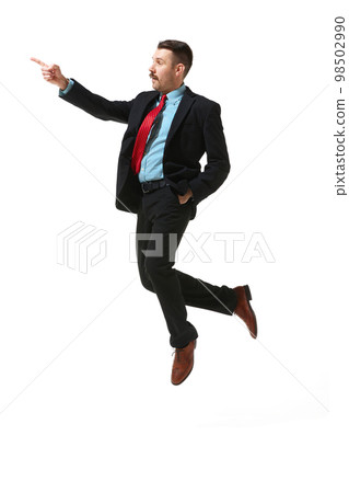 Businessman, office manager in a suit over white studio background. Control over projects. Growing success. Concept of business, career, innovations, ad 98502990