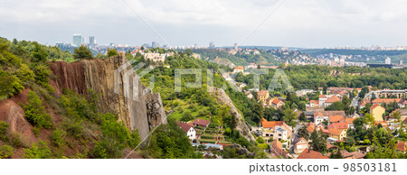 landscape with city panorama - Rock in Prokop valley in Prague, Czech republic landscape with city panorama - Rock in Prokop valley in Prague, Czech republic 98503181
