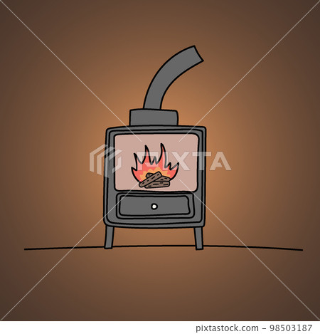 a fireplace burning in a dark room 98503187