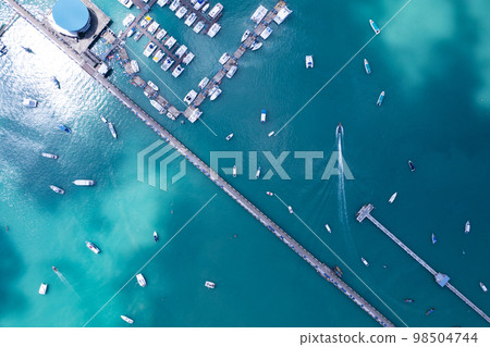 Aerial View Top down Drone shot of Yacht and sailboat parking in marina Transportation and travel background Beautiful sea in summer season 98504744