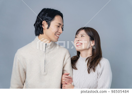 Cuddling couple couple photo pair look 98505484