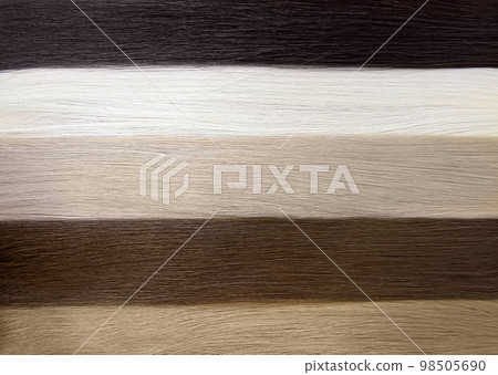 Strands of natural hair of different colors for extensions. Hair color palette Strands of natural hair of different colors for extensions. Hair color palette 98505690