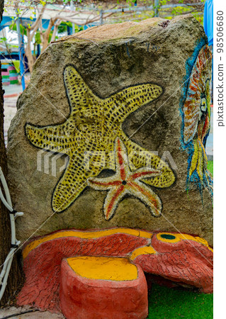 Drawing on a stone. 98506680