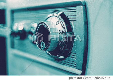 closeup rotation dial number key lock on safe box for security code image concept 98507396