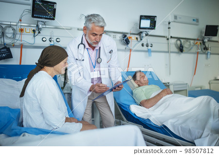 Senior woman lying in hospital room after chemotherapy. Senior woman lying in hospital room after chemotherapy. 98507812