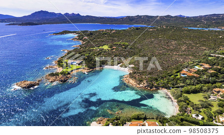 Italy summer holidyas . Sardegna island - stunning Emerald coast (costa smeralda) with most beautiful beaches  98508375