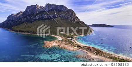 aerial drone panoramic view of splendid island and beach Tavolara in Sardegna, Italy.  98508383