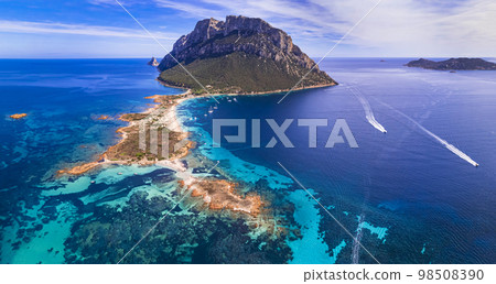 aerial drone panoramic view of splendid island and beach Tavolara in Sardegna, Italy. aerial drone panoramic view of splendid island and beach Tavolara in Sardegna, Italy. 98508390