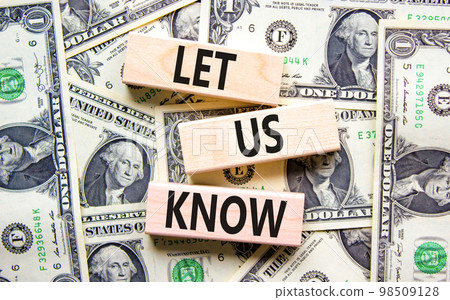 Let us know symbol. Concept words Let us know on wooden blocks on a beautiful background from dollar bills. Business and let us know concept. Copy space. Let us know symbol. Concept words Let us know on wooden blocks on a beautiful background from dollar bills. Business and let us know concept. Copy space. 98509128