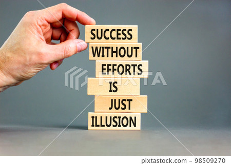 Success symbol. Concept words Success without efforts is just illusion on wooden blocks on a beautiful grey table grey background. Businessman hand. Business success and efforts concept. 98509270