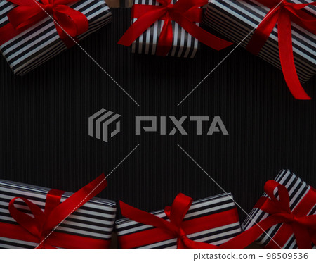 Gifts on the black background 98509536