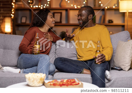 Black couple in love having date at home 98511211