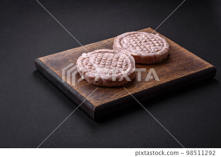 Raw meat balls with spices and herbs or crepinette Raw meat balls with spices and herbs or crepinette 98511292