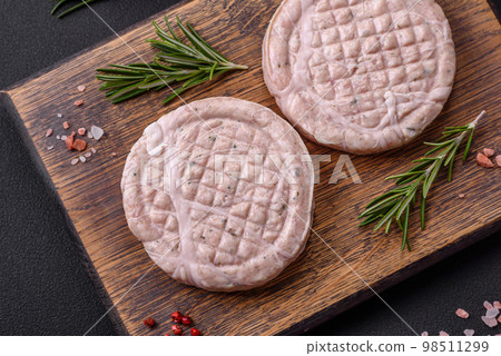 Raw meat balls with spices and herbs or crepinette Raw meat balls with spices and herbs or crepinette 98511299
