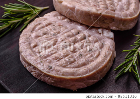 Raw meat balls with spices and herbs or crepinette Raw meat balls with spices and herbs or crepinette 98511316