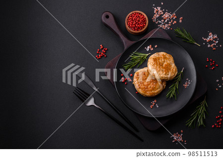 Grilled meatballs with spices and herbs or crepinette 98511513