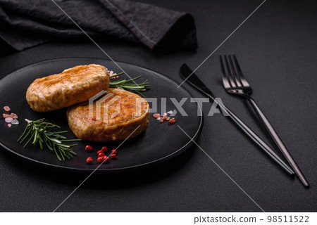 Grilled meatballs with spices and herbs or crepinette Grilled meatballs with spices and herbs or crepinette 98511522