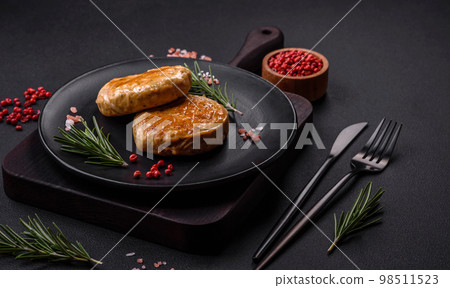 Grilled meatballs with spices and herbs or crepinette Grilled meatballs with spices and herbs or crepinette 98511523