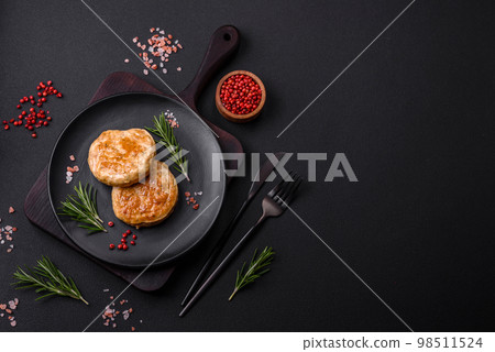 Grilled meatballs with spices and herbs or crepinette Grilled meatballs with spices and herbs or crepinette 98511524