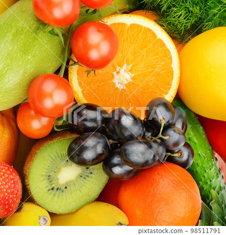 Beautiful background from various vegetables and fruits. 98511791