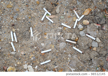 cigarette butts on the ground cigarette butts on the ground 98512145