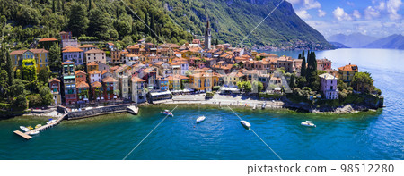 One of the most beautiful lakes of Italy - Lago di Como. aerial panoramic view of beautiful Varenna village One of the most beautiful lakes of Italy - Lago di Como. aerial panoramic view of beautiful Varenna village 98512280