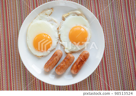 Fried eggs for breakfast Fried eggs for breakfast 98513524