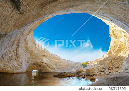 View of the volcanic open cave of Sykia, Milos island, Cyclades, Greece 98513893