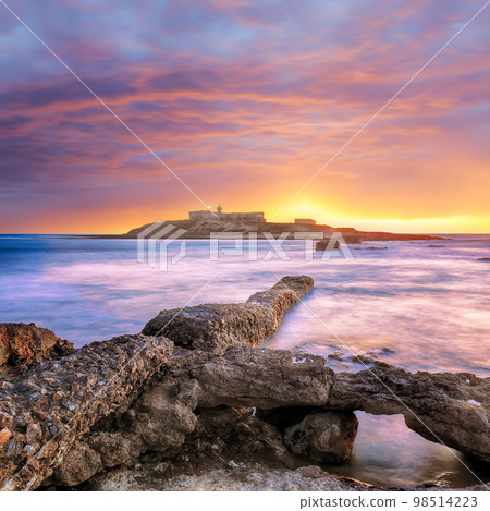 Dramatic evening scene of awesome spring seascape on the Passero cape Sicily. 98514223