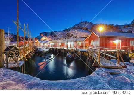 Fabulous evening seascape of Norwegian sea and cityscape of Nusfjord village. 98514262