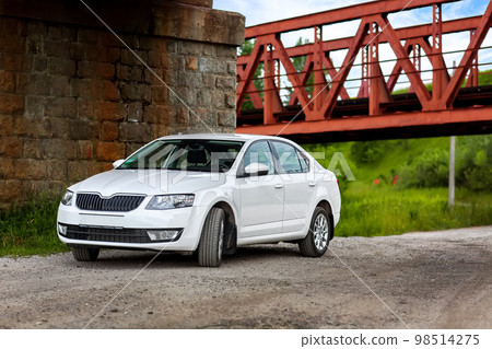 Front-side view of a car on nature background 98514275