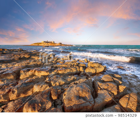 Dramatic morning scene of awesome spring seascape on the Passero cape Sicily. Dramatic morning scene of awesome spring seascape on the Passero cape Sicily. 98514329