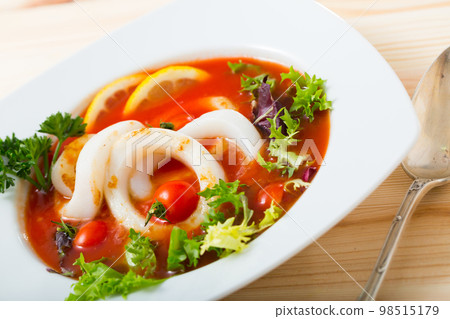 Tomato soup with squid is tasty dish Tomato soup with squid is tasty dish 98515179