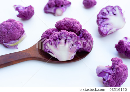 Purple cauliflower on white background. Purple cauliflower on white background. 98516150