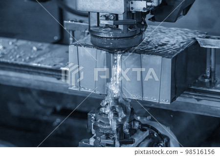 Closeup scene the wire EDM machine cutting the mold insert parts. 98516156
