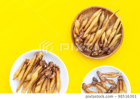 Fingerroot on a yellow background. Fingerroot on a yellow background. 98516301