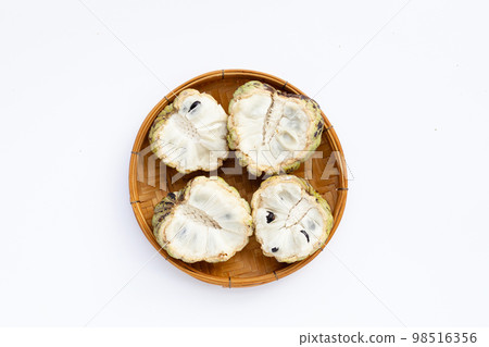 Custard apple in white plate on white background. Custard apple in white plate on white background. 98516356