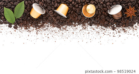 Dark roasted coffee beans setup on white background with copy space. 98519024