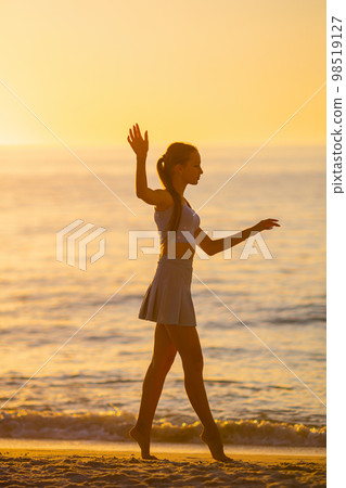 Happy young girl enjoy tropical beach vacation Happy young girl enjoy tropical beach vacation 98519127