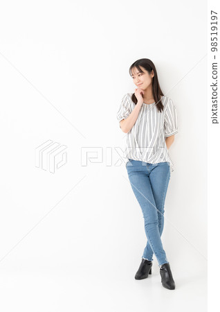 Thinking woman full body portrait Thinking woman full body portrait 98519197