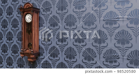 Vintage wooden clock on the wall with wallpaper. 3D illustration 98520580