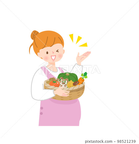籃子裡有蔬菜的年輕孕婦 98521239