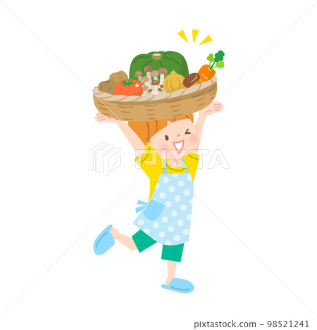 一個男孩提著籃子裡的蔬菜 一個男孩提著籃子裡的蔬菜 98521241